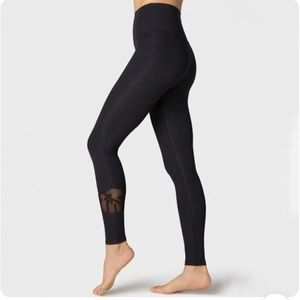 Beyond Yoga black leggings with leaf cut-out